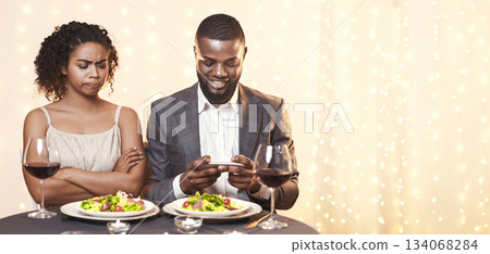 Annoyed afro woman looking at her man using phone while having date in restaurant, conflicts in couple concept Annoyed afro woman looking at her man using phone while having date in restaurant, conflicts in couple concept 134068284