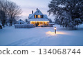A quaint house sits peacefully in a snowy landscape at twilight. Soft light streams from the windows, highlighting the tranquility of the scene, surrounded by trees and a winter wonderland. A quaint house sits peacefully in a snowy landscape at twilight. Soft light streams from the windows, highlighting the tranquility of the scene, surrounded by trees and a winter wonderland. 134068744