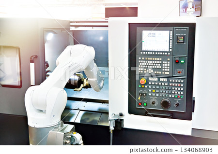 Robotic arm and cnc lathe machine Robotic arm and cnc lathe machine 134068903