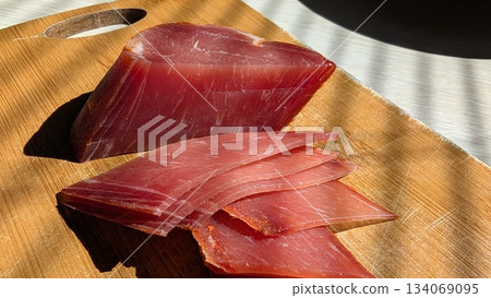 Sophisticated serving of expertly sliced ham with detailed texture Sophisticated serving of expertly sliced ham with detailed texture 134069095