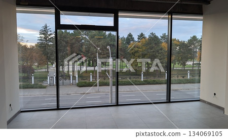 Spacious bright chamber, Open space featuring panoramic window vistas Spacious bright chamber, Open space featuring panoramic window vistas 134069105