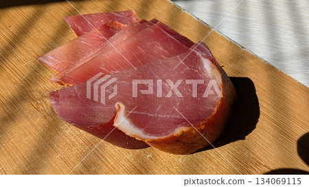 Thin ham slices with bread, Cozy brunch scene with meat and cheese 134069115