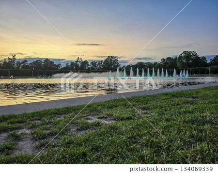 Golden Fountain Dancing Waters at Sunset Golden Fountain Dancing Waters at Sunset 134069339