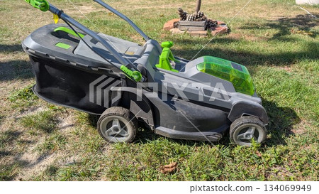 The Electric Lawn Mower is an essential equipment for maintaining your garden and yard The Electric Lawn Mower is an essential equipment for maintaining your garden and yard 134069949