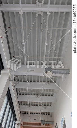 Modern industrial ceilings are vital for a functional, aesthetic space using steel and minimalism 134069955