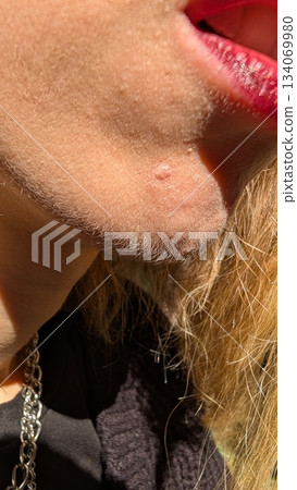 CloseUp Portrait Featuring a Bold Lip Color Along with Fashion Accessories to Enhance Style CloseUp Portrait Featuring a Bold Lip Color Along with Fashion Accessories to Enhance Style 134069980