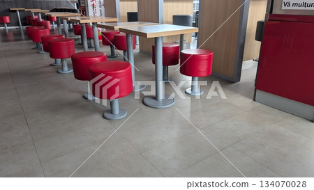 Modern Red Seating Featured in a Chic and Contemporary Dining Area That Invites Gatherings 134070028