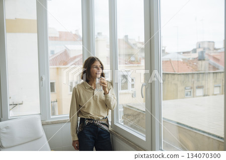 Casual writer appreciating daylight during peaceful break 134070300