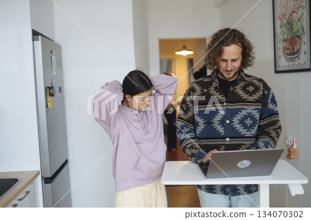 Parents and daughter arranging their daily tasks calmly 134070302