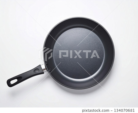 Home still life. Cast iron pan. Kitchenware on white background. Top view. Home still life. Cast iron pan. Kitchenware on white background. Top view. 134070681