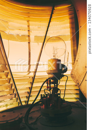 inside of a lighthouse showing the light bulb interior. inside of a lighthouse showing the light bulb interior. 134070928