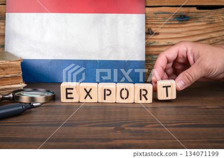 Dutch Flag Background With Wooden Blocks Spelling Export on Wooden Table 134071199
