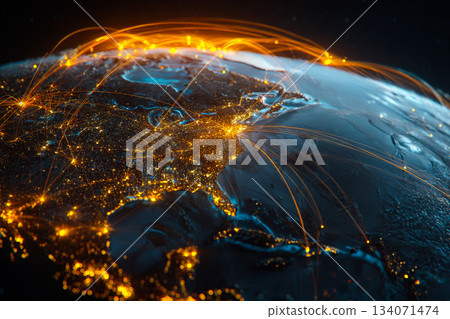 A detailed view of a glowing holographic planet Earth features vibrant orange and blue colors, highlighting major cities and connections around the world at night. 134071474