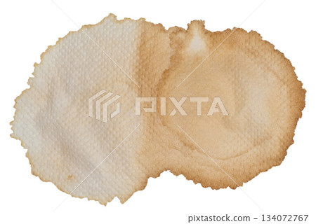 Macro shot of a large, dried coffee stain on a textured white paper napkin Macro shot of a large, dried coffee stain on a textured white paper napkin 134072767