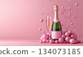 Festive background with Christmas and New Year. Bottle of champagne and sparkles pink background. Celebration banner concept. 134073185
