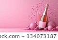 Festive background with Christmas and New Year. Bottle of champagne and sparkles pink background. Celebration banner concept. 134073187
