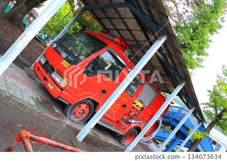 A fire engine used in firefighting activities @ A preserved vehicle at Kyodo no Mori Park in Fuchu City, Tokyo 134073634