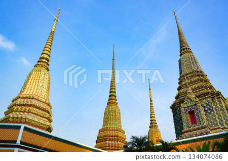 The spire of a historic and traditional Thai building 134074086