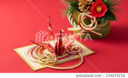 A festive background image with Japanese-style New Year decorations and Mizuhiki strings A festive background image with Japanese-style New Year decorations and Mizuhiki strings 134074258