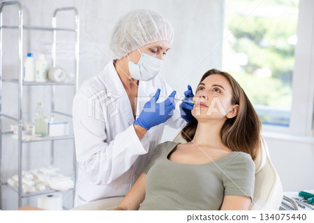 Facial injection young patient 134075440