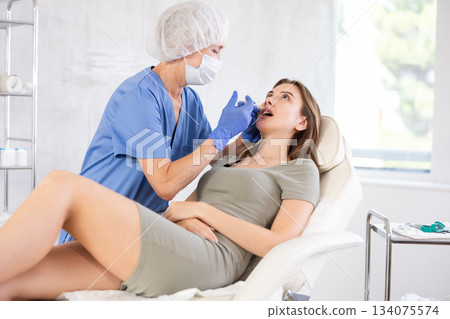 Facial injection young patient 134075574