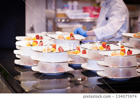 Material image of a chef working in a French kitchen 134075974