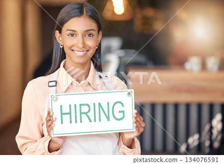 Woman, hiring sign or portrait smile in small business for recruitment, hire or job opportunity at cafe. Happy, confident or female employer or owner with coffee shop recruiting or advertising poster 134076591