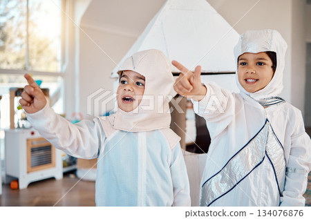 Astronaut, home and children pointing, playing and role play space travel, fantasy games or explore new discovery. Rocket spaceship, creative halloween costume and kids imagine a galaxy adventure 134076876