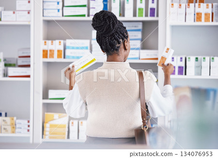 Woman, drugs and shelf for healthcare illness, pain or relief at pharmacy looking at pills or medication. Sick female customer or patient taking pharmaceutical products for self diagnosis at a clinic 134076953