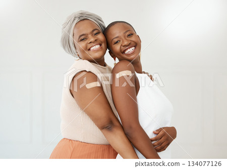 Vaccine, plaster and portrait of black women after an injection as a medical cure isolated in a white background. Healthcare, wellness and happy friends in a hospital or clinic for medicine together Vaccine, plaster and portrait of black women after an injection as a medical cure isolated in a white background. Healthcare, wellness and happy friends in a hospital or clinic for medicine together 134077126