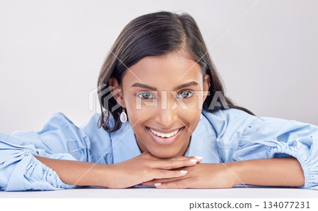 Face, smile and portrait of woman relax feeling happy, confident and excited isolated in a studio white background. Employee, head and Indian female worker proud, happiness and confidence Face, smile and portrait of woman relax feeling happy, confident and excited isolated in a studio white background. Employee, head and Indian female worker proud, happiness and confidence 134077231