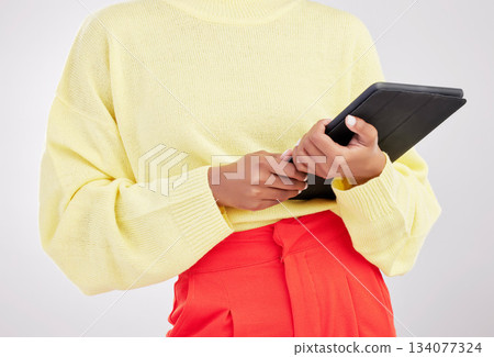 Technology, studio and hands of woman with tablet for research, communication and networking. White background, contact and female with digital tech for social media, internet website and mobile app 134077324