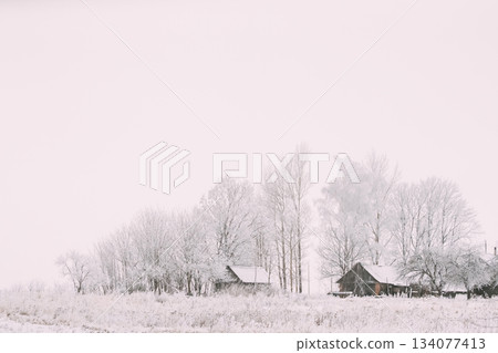 Landscape With Old Wooden Houses At Snowy Winter Frosty Day Landscape With Old Wooden Houses At Snowy Winter Frosty Day 134077413