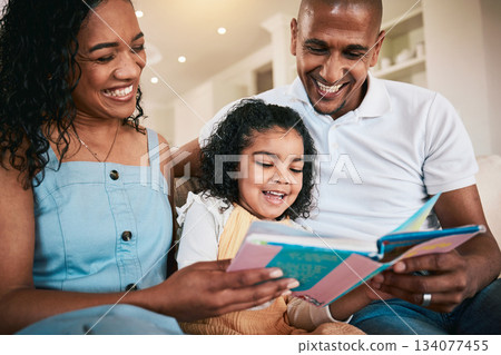 Happy family, laugh or child reading story book, funny cartoon comic and home bonding with mother, father or parents. Love, smile or young kid listening to comedy storytelling for youth entertainment 134077455