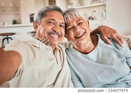 Selfie, hug and portrait of happy elderly couple, bonding and enjoy retirement time together at home. Memory photo, love and senior man, woman or people embrace for happiness, marriage unity and care Selfie, hug and portrait of happy elderly couple, bonding and enjoy retirement time together at home. Memory photo, love and senior man, woman or people embrace for happiness, marriage unity and care 134077474