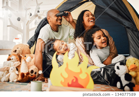 Family, living room and tent with children, games and toys for bonding, love and playing together. Parents, girl kids and laughing with mom, dad or camping game in home with happiness on lounge floor Family, living room and tent with children, games and toys for bonding, love and playing together. Parents, girl kids and laughing with mom, dad or camping game in home with happiness on lounge floor 134077589