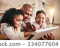 Happy family father, tablet and children elearning, doing kindergarten homework or remote home school. Education, learning software and young kid studying on floor for youth development lesson 134077604