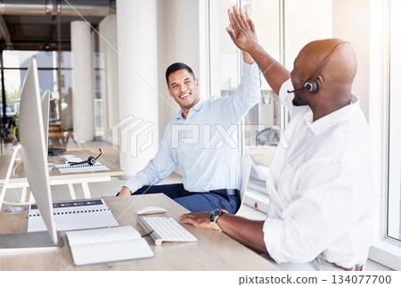 Call center, happy business men and high five of team, success and celebrate winning deal. Diversity, telemarketing and celebration of sales target, excited telecom achievement or bonus trading goals Call center, happy business men and high five of team, success and celebrate winning deal. Diversity, telemarketing and celebration of sales target, excited telecom achievement or bonus trading goals 134077700