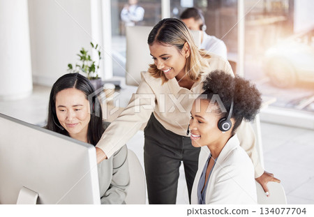 Call center, women and team manager at computer in sales office for coaching at help desk. Happy business people, telemarketing collaboration and review online solution, consulting and crm management Call center, women and team manager at computer in sales office for coaching at help desk. Happy business people, telemarketing collaboration and review online solution, consulting and crm management 134077704