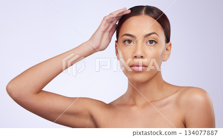 Hand, portrait or natural makeup on woman in studio isolated on white background for skincare. Facial treatment, beauty grooming or zen girl model relaxing with glow or luxury self care cosmetics 134077887