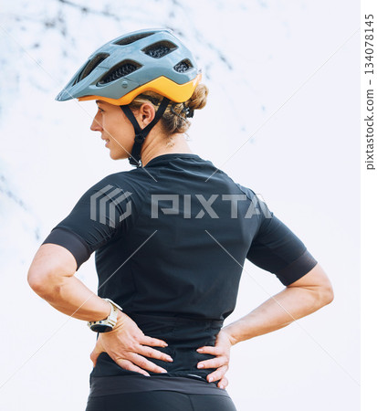 Bicycle, athlete and woman outdoor with rest and relaxing after exercise, fitness and cycling. Race training, wellness and female cyclist with sports and bike workout in nature ready for challenge Bicycle, athlete and woman outdoor with rest and relaxing after exercise, fitness and cycling. Race training, wellness and female cyclist with sports and bike workout in nature ready for challenge 134078145