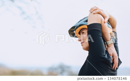 Sports, cycling and arm stretch by woman outdoors for training, exercise and warm up. Start, stretching and female cyclist prepare for fitness, cardio and routine in the countryside, calm and content Sports, cycling and arm stretch by woman outdoors for training, exercise and warm up. Start, stretching and female cyclist prepare for fitness, cardio and routine in the countryside, calm and content 134078146
