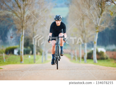 Cycling, fitness and travel with woman in park path for training, workout and health. Exercise, race and freedom with female cyclist riding on bike in nature for adventure, journey and transport Cycling, fitness and travel with woman in park path for training, workout and health. Exercise, race and freedom with female cyclist riding on bike in nature for adventure, journey and transport 134078255