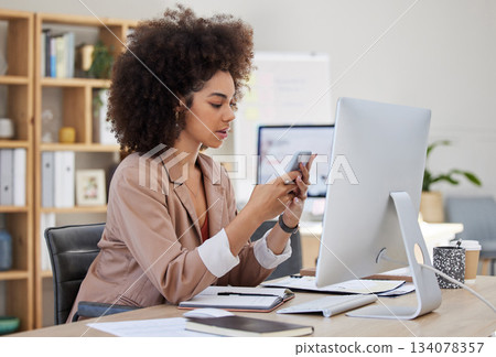 Business, phone or woman on social media to relax online on a break at workplace office desk. Mobile app, typing or biracial girl journalist texting or searching for blogs, news or internet articles Business, phone or woman on social media to relax online on a break at workplace office desk. Mobile app, typing or biracial girl journalist texting or searching for blogs, news or internet articles 134078357