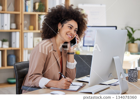 Phone call, computer and woman writing, talking and business networking, online advice or happy virtual help in office. Professional biracial person in conversation, planning and thinking on computer 134078360