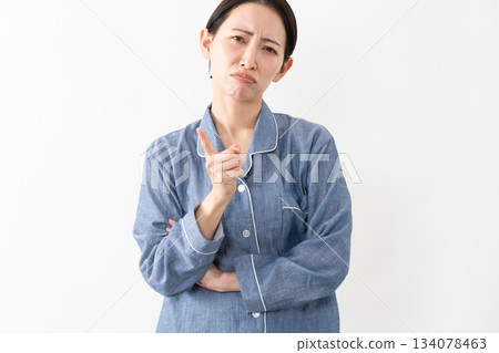 Woman wearing pajamas Lifestyle image Woman wearing pajamas Lifestyle image 134078463