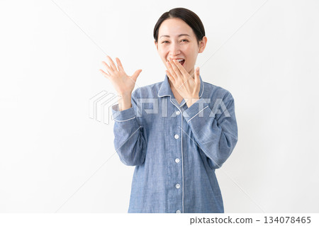 Woman wearing pajamas Lifestyle image Woman wearing pajamas Lifestyle image 134078465