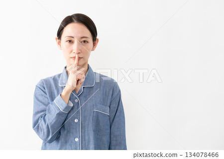 Woman wearing pajamas Lifestyle image Woman wearing pajamas Lifestyle image 134078466