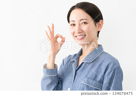 Woman wearing pajamas Lifestyle image 134078475