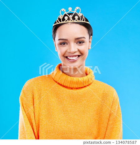 Winner, crown and portrait of woman in studio for celebration, princess and party. Smile, beauty and fashion with female and tiara on blue background excited for achievement, winner and prom event Winner, crown and portrait of woman in studio for celebration, princess and party. Smile, beauty and fashion with female and tiara on blue background excited for achievement, winner and prom event 134078587